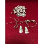TWO VINTAGE SILVER NAVEJO INDIAN BROOCHES AND A PART SILVER NAVEJO BEADED NECKLACE FOR RESTRINGING.