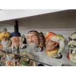 A GROUP OF FIVE ROYAL DOULTON CHARACTER JUGS.