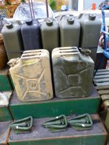 FIVE MILITARY WATER CANS, TWO FUEL CANS AND THREE FOLDING TRENCH SHOVELS.