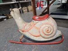 A VINTAGE MOBO ROCKING CHILDS SNAIL.