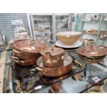 COPPER PANS, DECORATED TRAYS, A MARBLE LAZY SUSAN, A MIXING BOWL, ETC