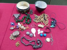 A SMALL ART POTTERY DEEP BOWL, EASTERN NECKLACES, COSTUME BEADS ETC.