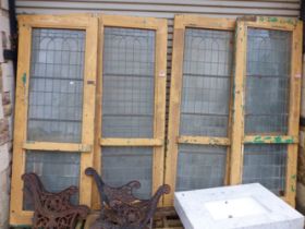 SIX MATCHING ART DECO BRONZED GLAZED INTERIOR DOORS.