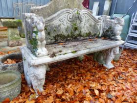 AN IMPRESSIVE SECTIONAL COMPOSITE GARDEN SEAT WITH LION DECORATIONS.