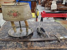 AN ANTIQUE BAYONET AND A TOLE WARE TABLE LAMP.