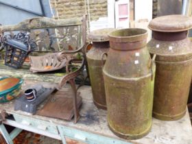 THREE VINTAGE MILK CHURNS, A TRACTOR SEAT AND A WALL LANTERN.