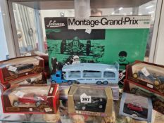 A SCHUCO GRAND PRIX SET AND OTHER DIE CAST VEHICLES.