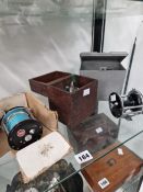 FOUR FISHING REELS BY IMMEC, PENN AND OTHERS