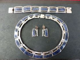 A MEXICAN SILVER FLAT STONE SET PANEL NECKLACE, BRACELET AND EARRINGS SUITE. SIGNED MEXICO, FDC,