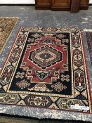 A NEEDLEPOINT RUG OF FRENCH DESIGN, 180 x 120 cm TOGETHER WITH FIVE DECORATIVE RUGS OF VARYING