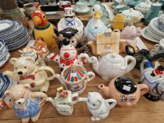 A COLLECTION OF NOVELTY TEA POTS