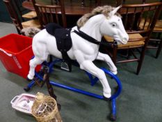 A VINTAGE STYLE ROCKING HORSE.