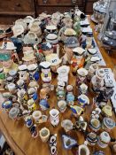 AN EXTENSIVE COLLECTION OF DOULTON AND OTHER SMALL CHARACTER JUGS.
