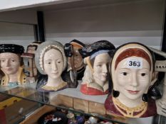 A COLLECTION OF DOULTON TOBY JUGS, HENRY VIII AND SIX WIVES.