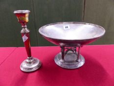 A HAMMERED ARTS AND CRAFTS SILVER PLATED TAZZA AND A HALLMARKED LOADED CANDLESTICK.