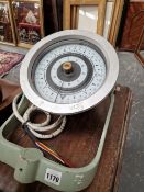 A VINTAGE SHIPS COMPASS.