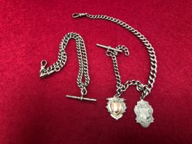 TWO HALLMARKED SILVER WATCH ALBERTS AND TWO FOBS. GROSS WEIGHT 89.34grms.