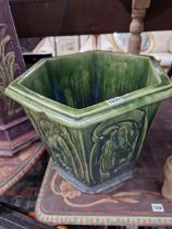 A GREEN GLAZED PLANTER BY GIBSON AND CO.