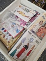 A COLLECTION OF VINTAGE DRESS MAKERS PATTERNS.