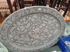 A LARGE EASTERN OVAL PLATTER WITH BIRD AND DEER DECORATION.