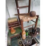 A CHILDS RUSH SEATED CHAIR, BOOKS, LETTER SCALES, TWO SALT GLAZE FLASKS AND A GREEN PHARMACY BOTTLE