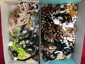 A LARGE COLLECTION OF VINTAGE AND CONTEMPORARY BEADED NECKLACES.
