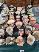 A QUANTITY OF DOULTON AND OTHER CHARACTER JUGS.