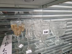 SEVEN CUT GLASS RUMMERS TOGETHER WITH FOUR LIQUEUR GLASSES