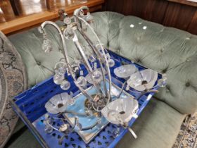 A CHANDELIER AND A TRAY.