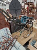 A VICTORIAN CHILDRENS DOG CARRIAGE.