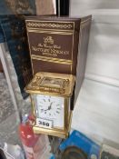 A MATTHEW NORMAN CARRIAGE CLOCK WITH ORIGINAL BOX.