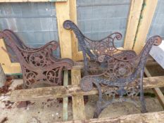 TWO PAIRS OF CAST IRON BENCH ENDS.