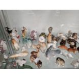 A COLLECTION OF LOMONOSOV AND OTHER RUSSIAN PORCELAIN ANIMAL FIGURES