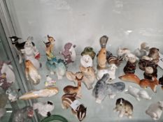 A COLLECTION OF LOMONOSOV AND OTHER RUSSIAN PORCELAIN ANIMAL FIGURES