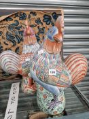 A PAIR OF CHINESE COCKEREL FIGURES
