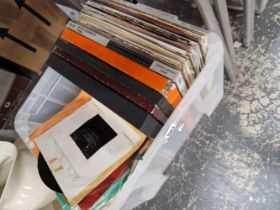 A COLLECTION OF RECORD ALBUMS AND SINGLES.