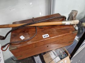 A VICTORIAN MAHOGANY WRITING SLOPE TOGETHER WITH AN ANTLER HANDLED HUNTING WHIP