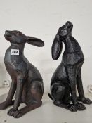 A PAIR OF LARGE ORNAMENTAL HARE FIGURES.
