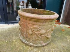 THREE SIMILAR CLASSICAL STYLE TERRACOTTA PLANTERS.