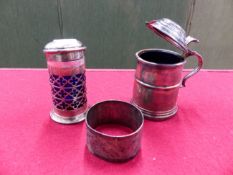 A HALLMARKED SILVER PEPPER, A LIDDED MUSTARD AND A PLATED NAPKIN RING. SILVER WEIGHT 100grms.