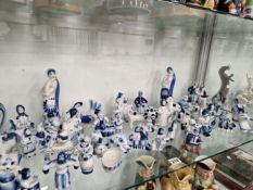 A COLLECTION OF LOMONOSOV AND OTHER RUSSIAN BLUE AND WHITE FIGURINES