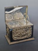 A LATE 19th C. ELECTROPLATE TWO COMPARTMENT TEA CADDY, THE HINGED LID AND SIDES WITH ELECTROTYPE