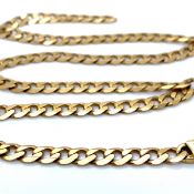 A SOLID LINK CURB CHAIN. UNHALLMARKED, ASSESSED AS 18ct GOLD. LENGTH 56cms. WEIGHT 51.94grms.