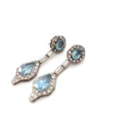 A PAIR OF ART DECO AQUAMARINE AND DIAMOND INTERCHANGEABLE EARRINGS. THE ARTICULATING DROPS REMOVE TO