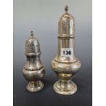 TWO HALLMARKED SILVER BALUSTER SHAPED CASTERS, THE SMALLER BY ATKINSONS, 392Gms.