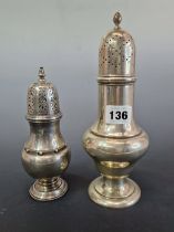 TWO HALLMARKED SILVER BALUSTER SHAPED CASTERS, THE SMALLER BY ATKINSONS, 392Gms.