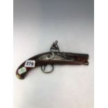 A BARNETT FLINTLOCK PISTOL WITH A BRASS TRIGGER GUARD AND A WOODEN RAMROD BELOW THE BARREL