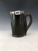 A SILVER RIMMED BLACK LEATHER JACK, THE MOUNT BY JACOB AND ROSS, SHEFFIELD 1906. H 17.5cms.