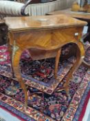 A 19th C. FRENCH KINGWOOD POUDREUSE TABLE, THE QUARTER VENEERED LID INSET WITH A SEVRES STYLE OVAL