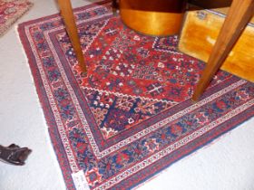 AN ANTIQUE PERSIAN JOSHEGAN RUG. 202 x 135cms